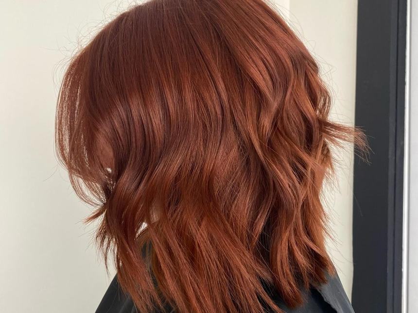 A copper bob cut and colored at Mane Escape Studio