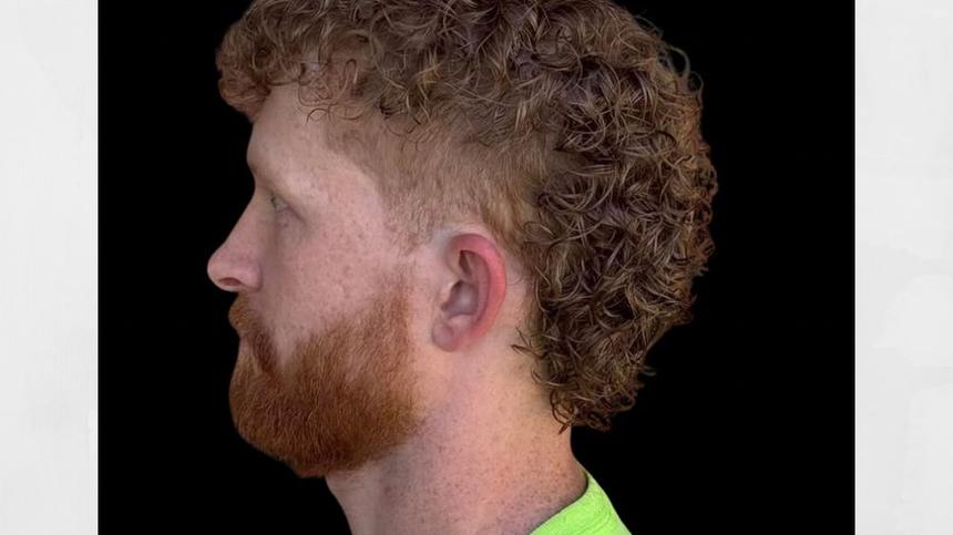 A perm and mullet cut by Megan Helms at Mane Escape Studio